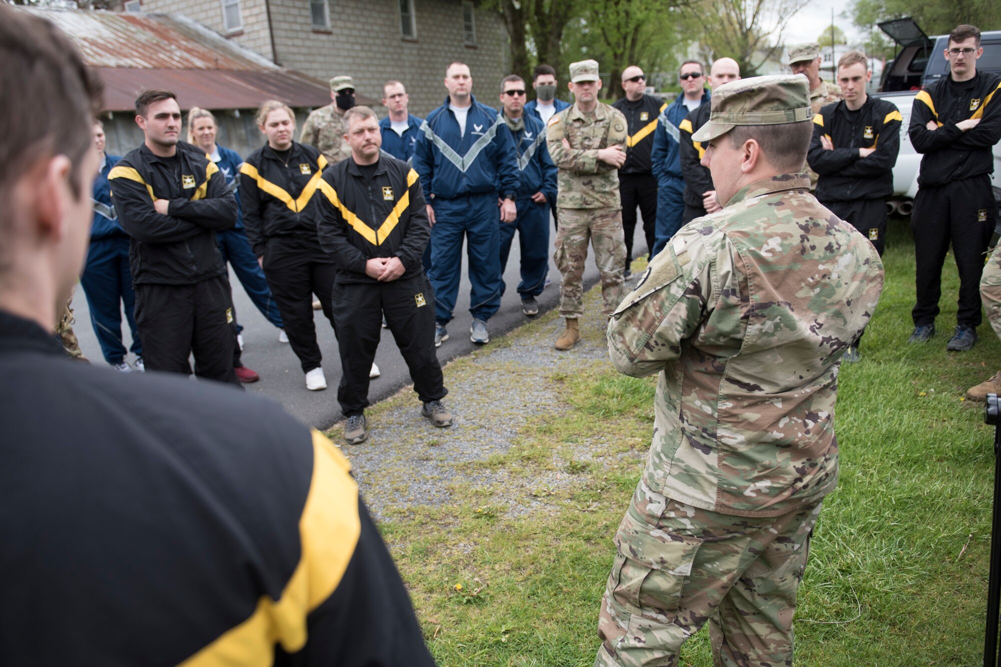 West Virginia Army National Guard 1st Sgt. Steven Light addresses members of Task Force Chemical, Biological, Radiological and Nuclear (CBRN) Response Enterprise (CRE) East at the start of a sanitization mission at the Children’s Home Society in Romney, W.Va., May 1. Task Force CRE has conducted sanitization and decontamination, COVID-19 swabbing, and personal protective equipment training across the state as part of the COVID-19 response efforts.