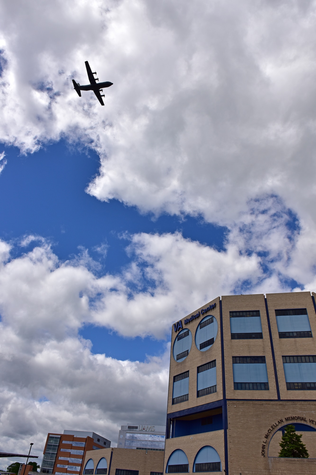 U.S. Air Force C-130s from Little Rock Air Force Base fly over Veterans Affairs Medical Center in downtown Little Rock Arkansas, May 8, 2020. The flyover was part of America Strong; a collaborative salute to recognize healthcare workers, first responders, military, and other essential personnel while standing in solidarity with all Americans during the COVID-19 pandemic. (U.S. Air Force photo by Staff Sgt. Jeremy McGuffin)