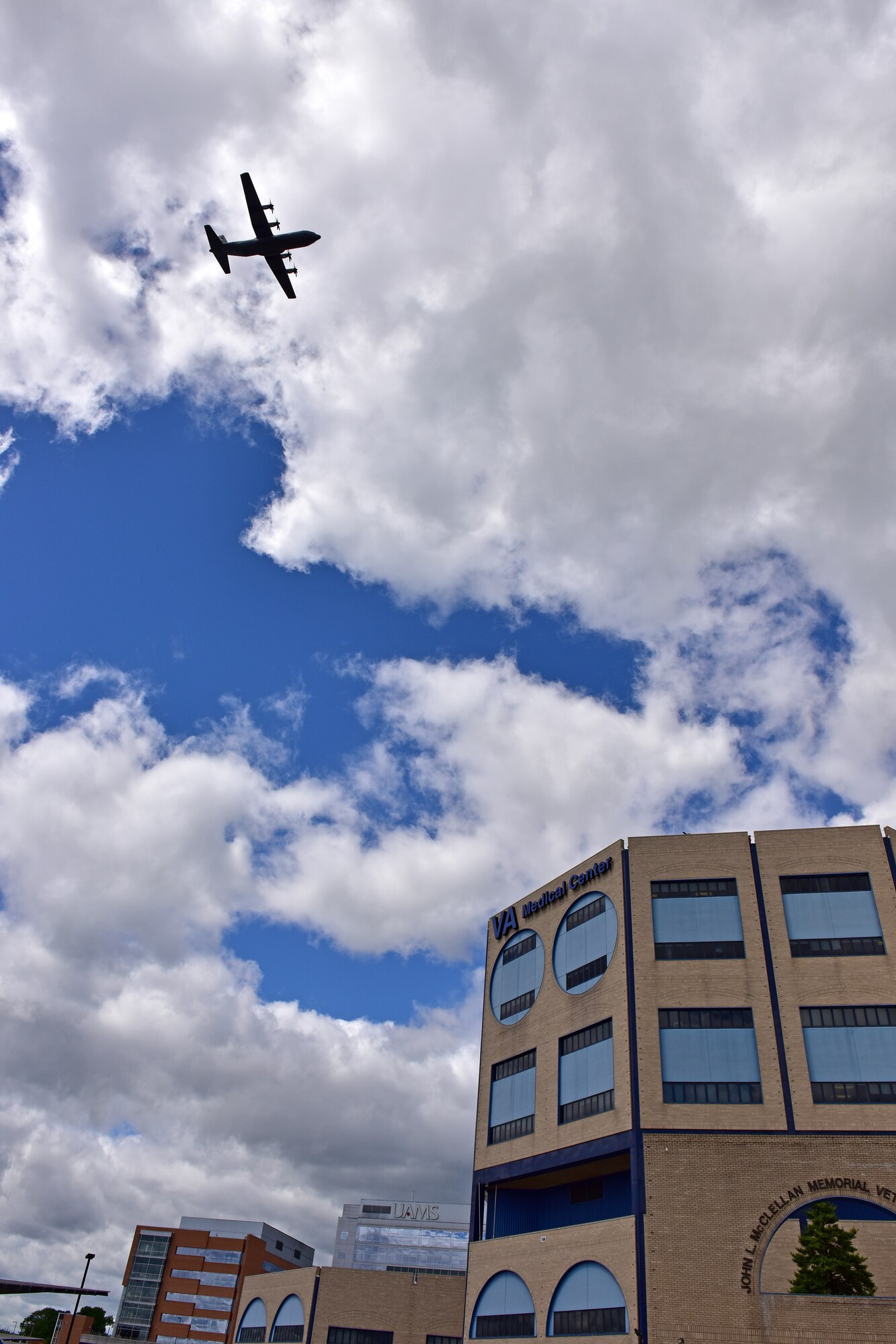 U.S. Air Force C-130s from Little Rock Air Force Base fly over Veterans Affairs Medical Center in downtown Little Rock Arkansas, May 8, 2020. The flyover was part of America Strong; a collaborative salute to recognize healthcare workers, first responders, military, and other essential personnel while standing in solidarity with all Americans during the COVID-19 pandemic. (U.S. Air Force photo by Staff Sgt. Jeremy McGuffin)