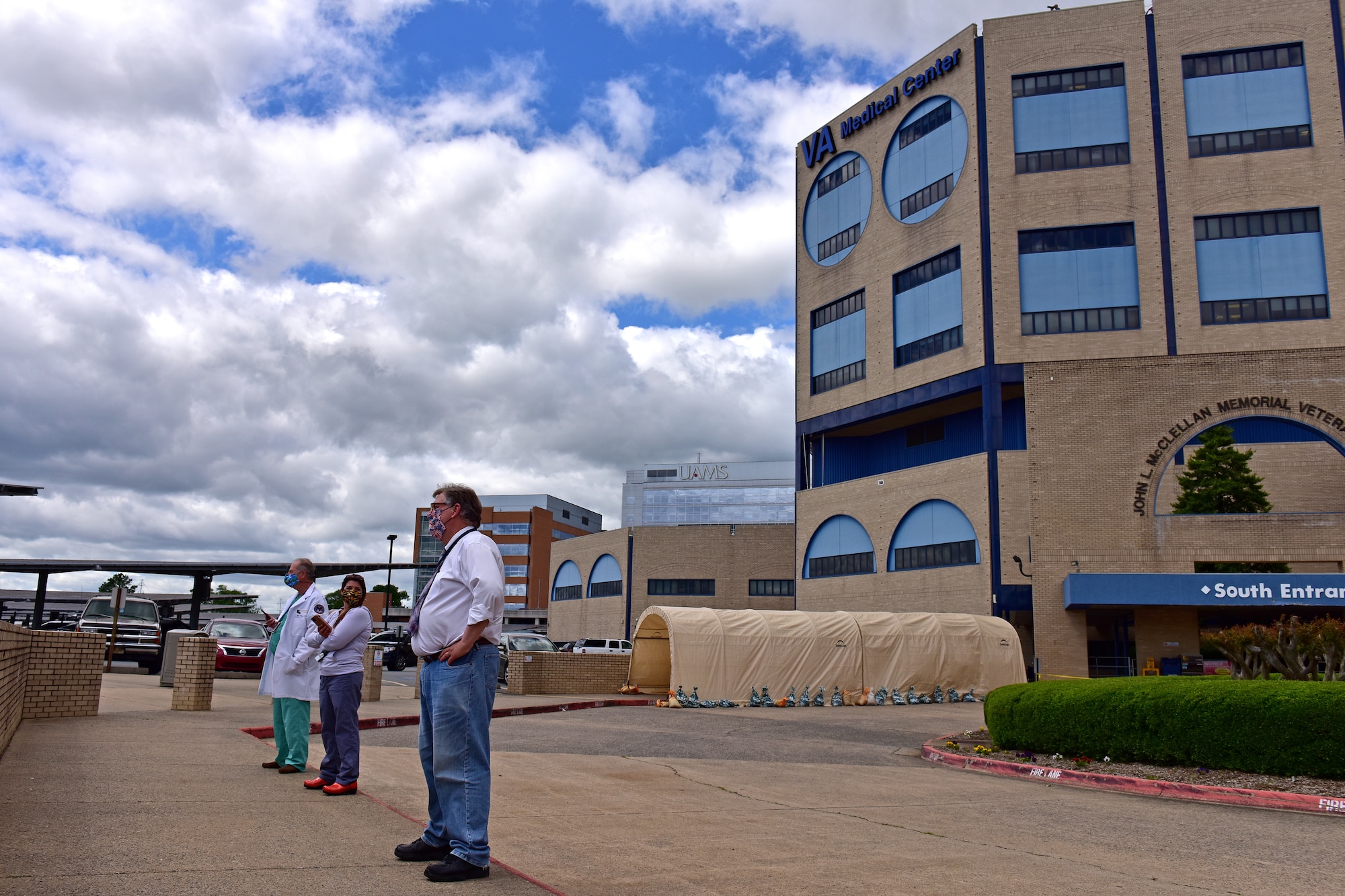 U.S. Air Force C-130s from Little Rock Air Force Base fly over Veterans Affairs Medical Center in downtown Little Rock Arkansas, May 8, 2020. The flyover was part of America Strong; a collaborative salute to recognize healthcare workers, first responders, military, and other essential personnel while standing in solidarity with all Americans during the COVID-19 pandemic. (U.S. Air Force photo by Staff Sgt. Jeremy McGuffin)