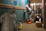 West Virginia National Guard Soldiers and Airmen assigned to Task Force Chemical, Biological, Radiological and Nuclear (CBRN) Response Enterprise (CRE) East, sanitize the Children’s Home Society in Romney, Va., May 1, 2020. Task Force CRE has conducted sanitization and decontamination, COVID-19 swabbing, and personal protective equipment training across the state as part of the COVID-19 response efforts.