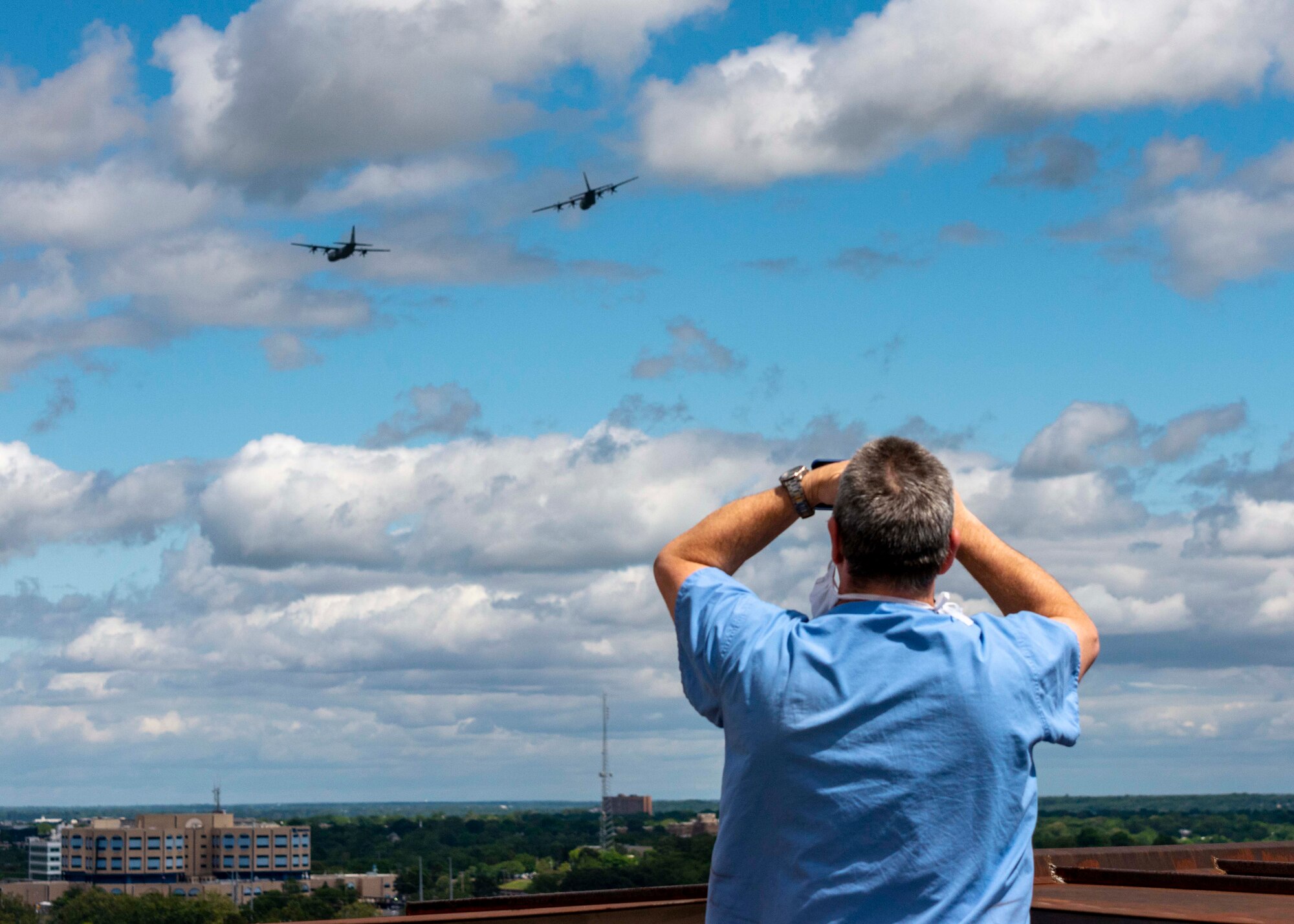 U.S. Air Force C-130s from Little Rock Air Force Base fly over healthcare facilities across Arkansas May 8, 2020. The flyover was part of America Strong; a collaborative salute to recognize healthcare workers, first responders, military and other essential personnel while standing in solidarity with all Americans during the COVID-19 pandemic. (U.S. Air Force Reserve photo by Maj. Ashley Walker)