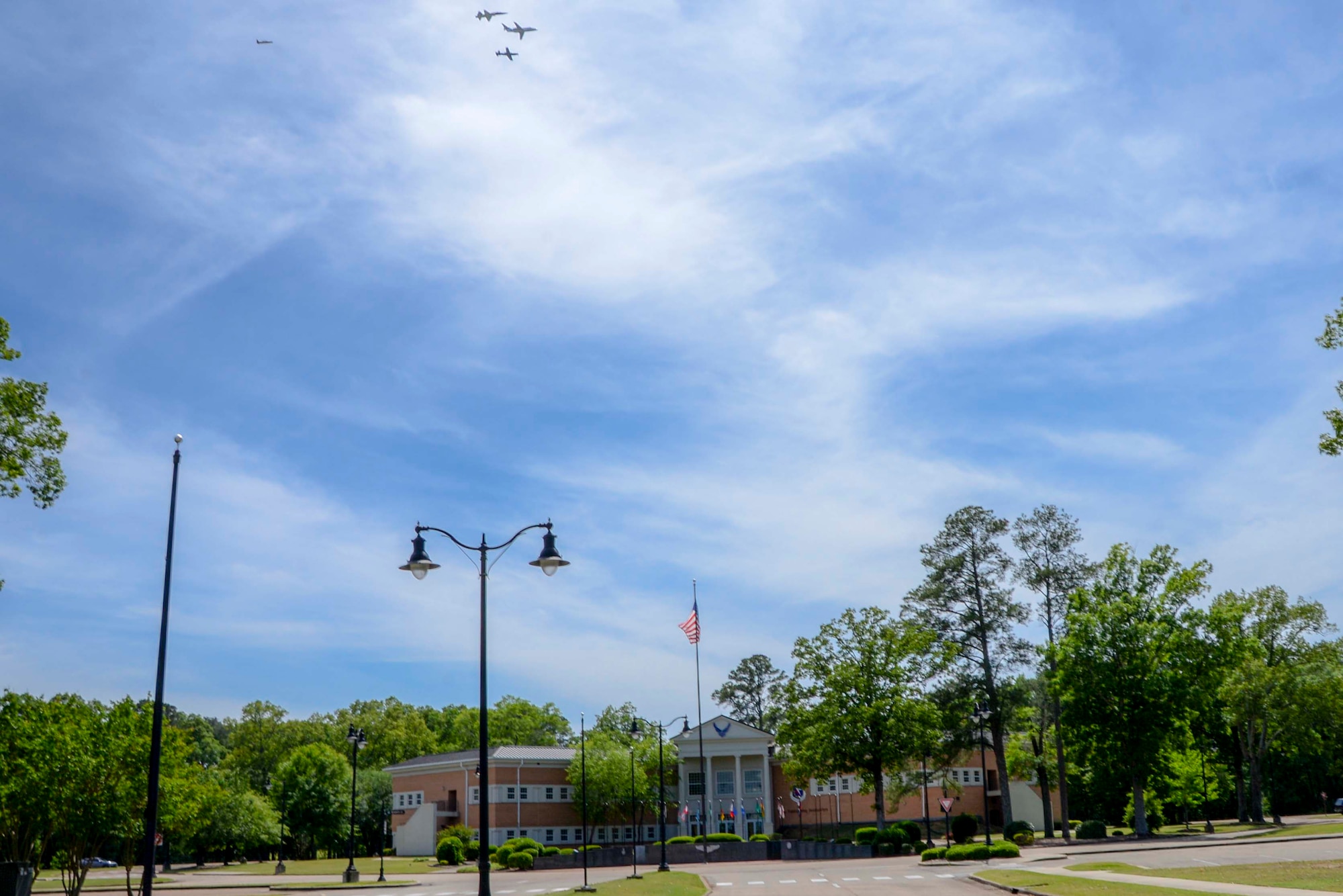 A dissimilar formation of aircraft from Columbus Air Force Base, Miss., fly over Columbus AFB May 9, 2020. The flyover was an opportunity to honor the men and women on the front lines in the fight against COVID-19 during the Defense Department’s #AmericaStrong salute. The flyover consisted of the T-6A Texan II, T-1A Jayhawk and the T-38 Talon. (U.S. Air Force photo by Tech. Sgt. Christopher Gross)