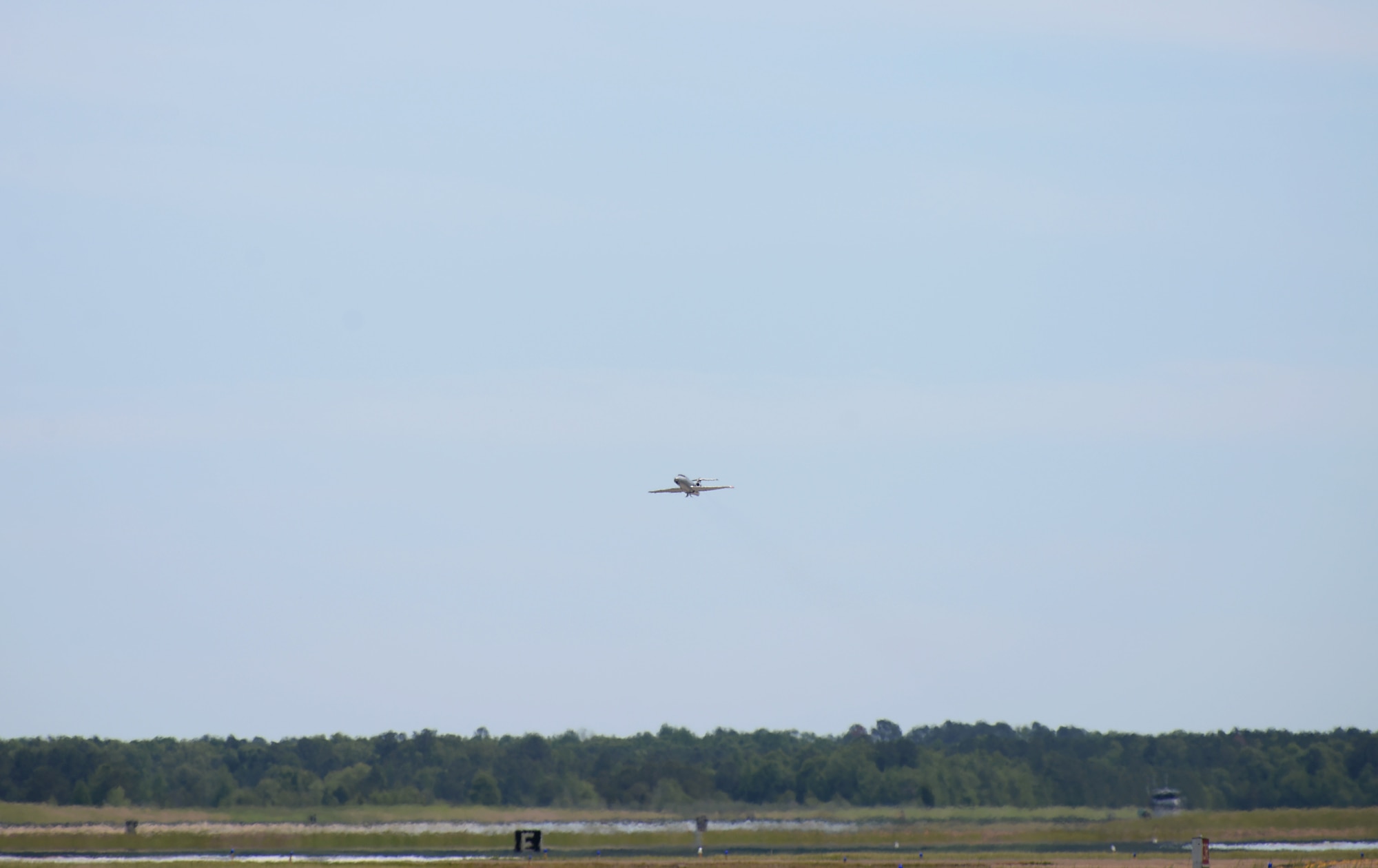 A T-1A Jayhawk departs Columbus Air Force Base, Miss., to fly in a dissimilar formation of aircraft, over various areas of Mississippi, May 9, 2020. The flyover was an opportunity to honor the men and women on the front lines in the fight against COVID-19 during the Defense Department’s  #AmericaStrong salute. The flyover consisted of the T-6A Texan II, T-1A Jayhawk and the T-38 Talon. (U.S. Air Force photo by Airman 1st Class Hannah Bean)