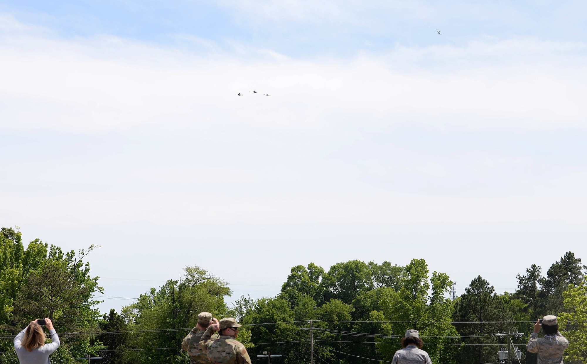 A dissimilar formation of aircraft from Columbus Air Force Base, Miss., fly over the Koritz Clinic. on May 9, 2020. The flyover was an opportunity to honor the men and women on the front lines in the fight against COVID-19 during the Defense Department’s #AmericaStrong salute. The flyover consisted of the T-6A Texan II, T-1A Jayhawk and the T-38 Talon. (U.S. Air Force photo by Airman 1st Class Hannah Bean)