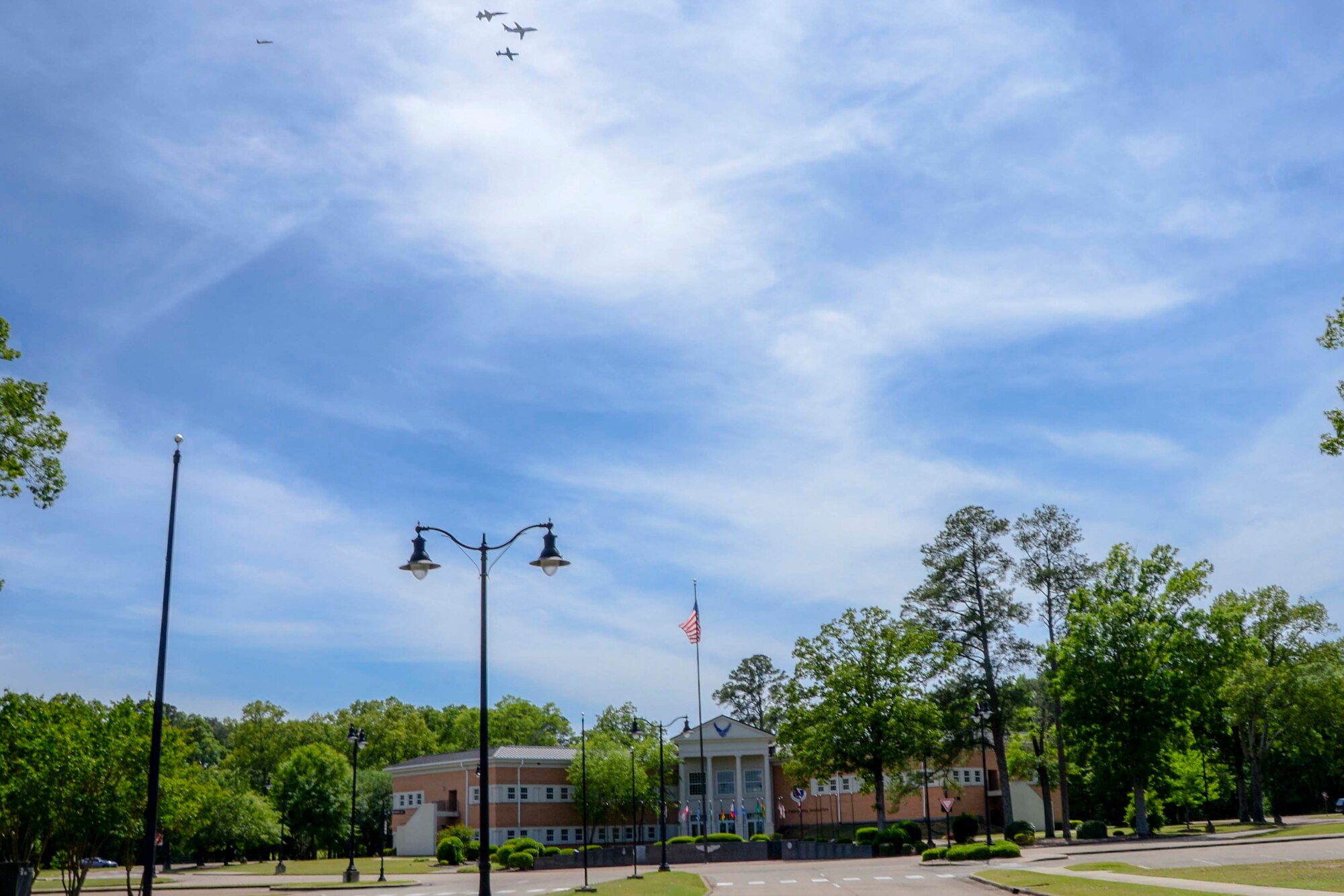 A dissimilar formation of aircraft from Columbus Air Force Base, Miss., fly over Columbus AFB May 9, 2020. The flyover was an opportunity to honor the men and women on the front lines in the fight against COVID-19 during the Defense Department’s #AmericaStrong salute. The flyover consisted of the T-6A Texan II, T-1A Jayhawk and the T-38 Talon. (U.S. Air Force photo by Tech. Sgt. Christopher Gross)