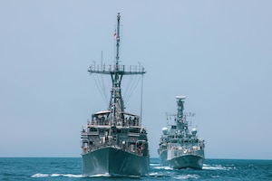 200428-A-DZ781-0017 ARABIAN GULF (May 28, 2020) – The HMS Argyll, HMS Shoreham and the mine countermeasures ship USS Dextrous (MCM 13) participate in the bilateral Mine Countermeasures Exercise 2020 (MCMEX 20) with the mine countermeasures ship USS Gladiator (MCM 11) in the Arabian Gulf, March 28. Gladiator is forward-deployed to the U.S. 5th Fleet area of operations in support of naval operations to ensure maritime stability and security in the Central region, connecting the Mediterranean and the Pacific through the Western Indian Ocean and three strategic choke points. (U.S. Army photo by Pfc. Christopher Cameron)