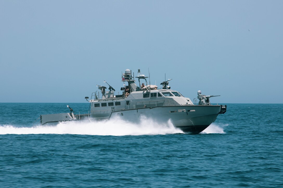 200428-A-DZ781-0026 ARABIAN GULF (May 28, 2020) – A Mark VI patrol boat participates in the bilateral Mine Countermeasures Exercise 2020 (MCMEX 20) with the mine countermeasures ship USS Gladiator (MCM 11) in the Arabian Gulf, March 28. Gladiator is forward-deployed to the U.S. 5th Fleet area of operations in support of naval operations to ensure maritime stability and security in the Central region, connecting the Mediterranean and the Pacific through the Western Indian Ocean and three strategic choke points. (U.S. Army photo by Pfc. Christopher Cameron)
