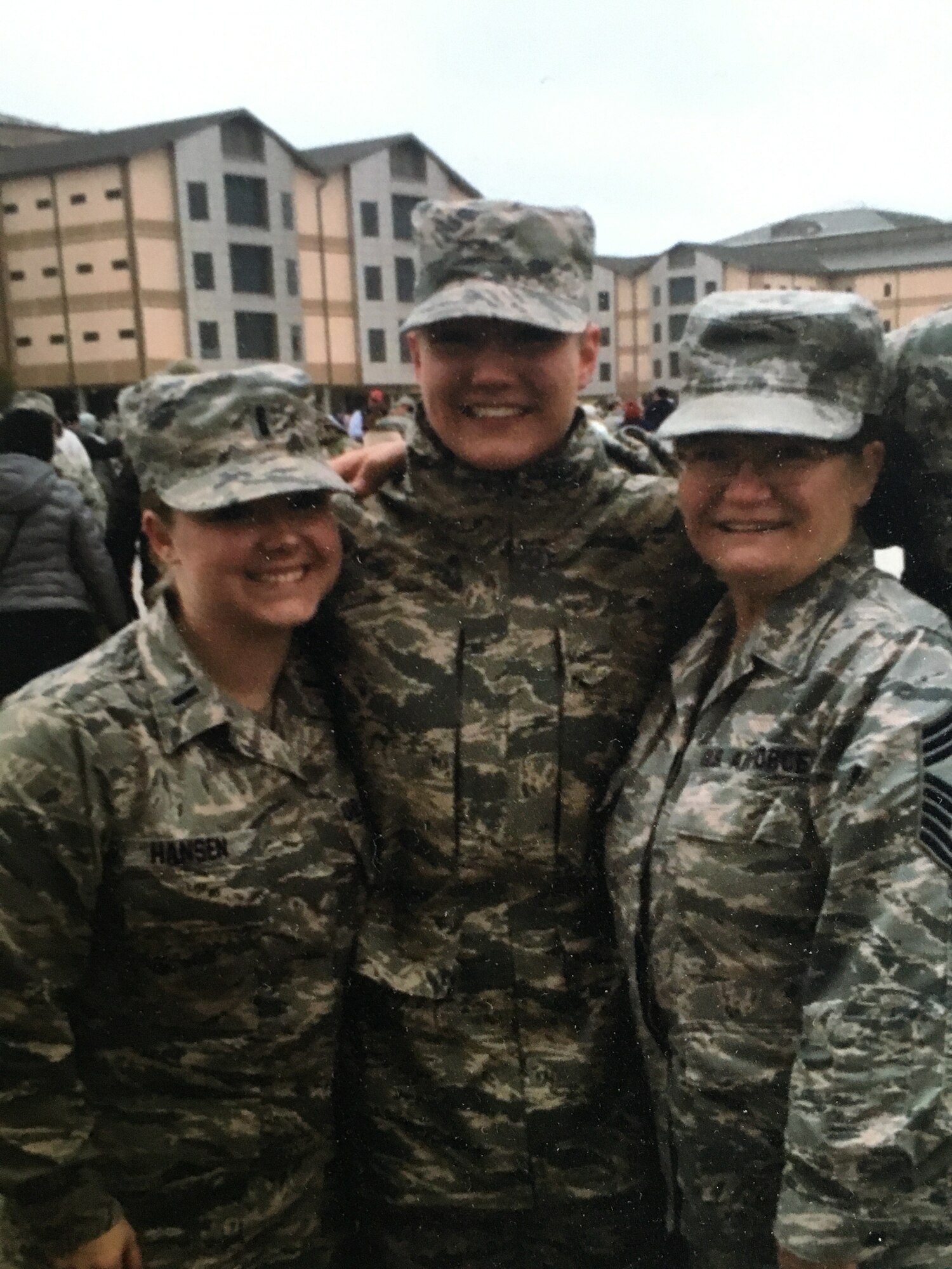 Three women pose in photo