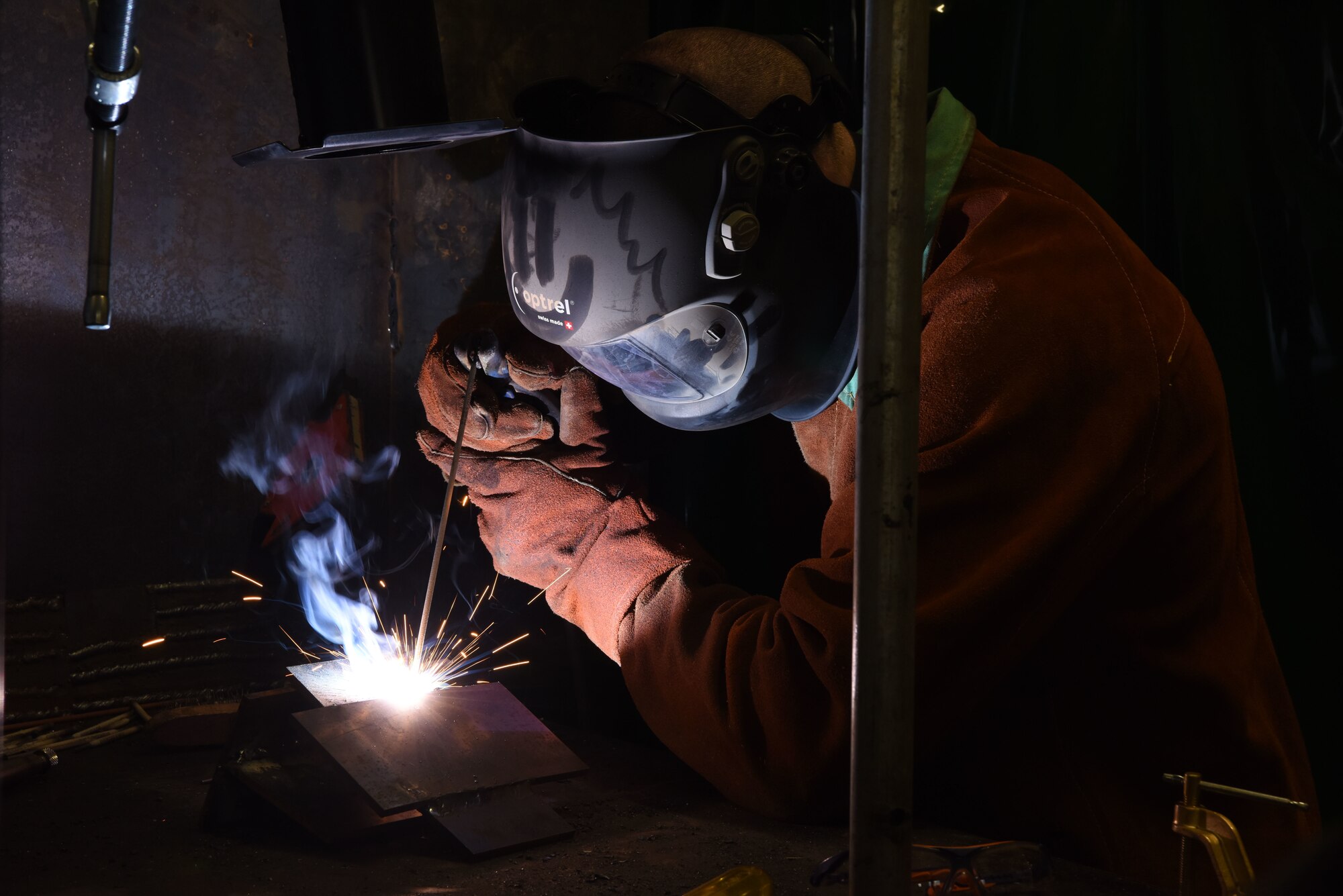 U.S. Air Force Airman 1st Class Stephen Thomas, 786th Civil Engineer Squadron structures, fuses metal during a welding course.