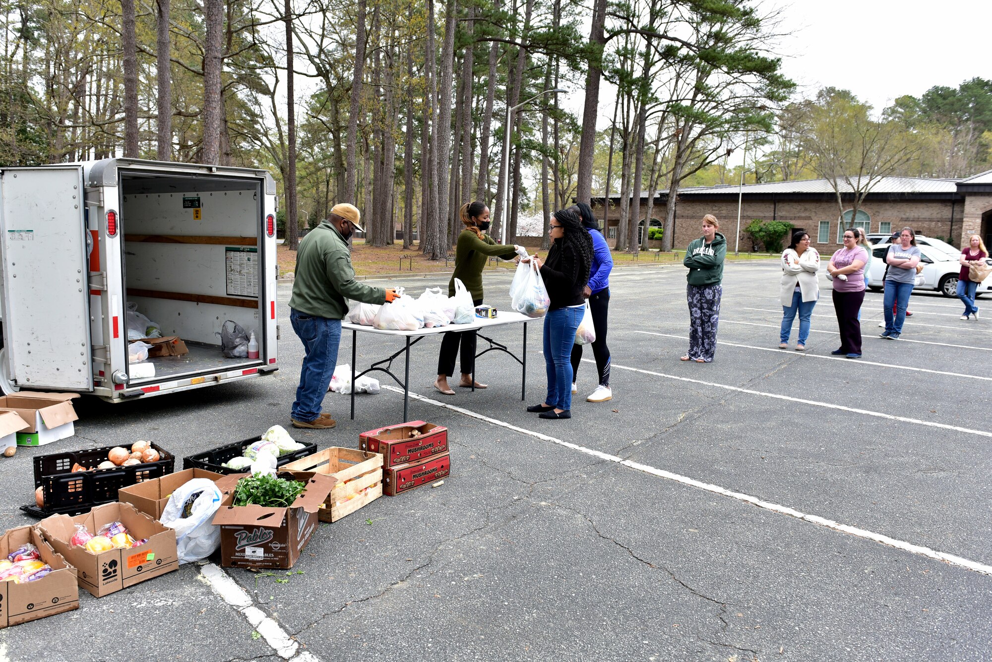 Customers pick-up produce during a bi-monthly produce run at Seymour Johnson Air Force Base, N.C. on March 22, 2020.