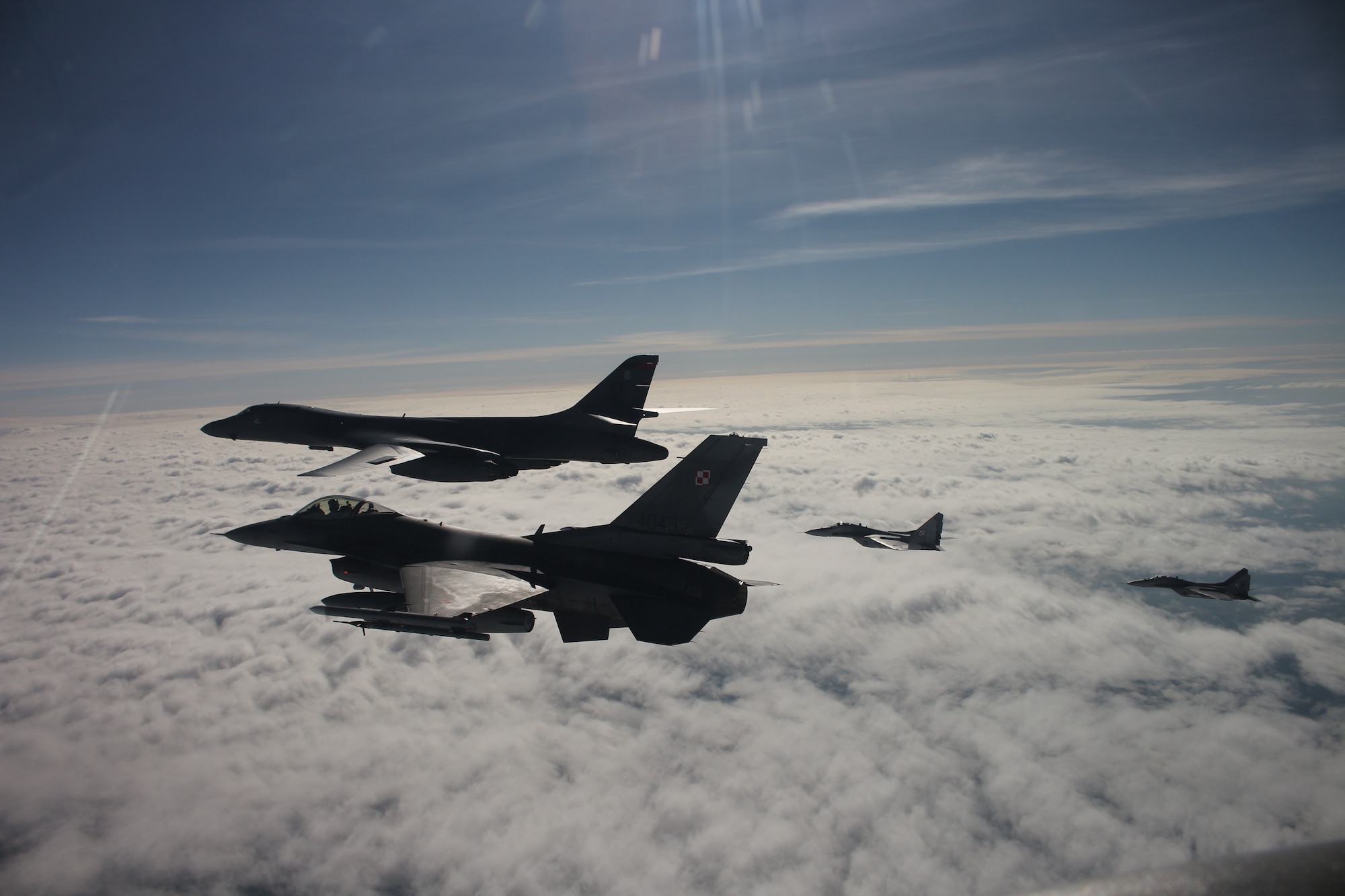 Military aircraft flying in the sky