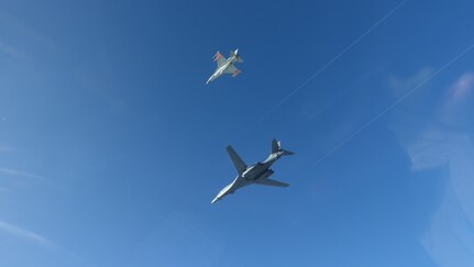 Military aircraft flying in the sky