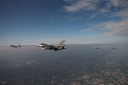 Military aircraft flying in the sky