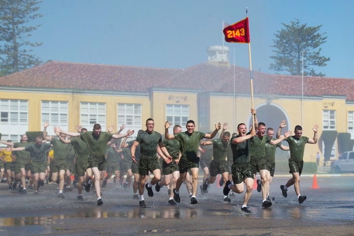 New Marines with Golf Company, 2nd Recruit Training Battalion, participate in a motivational run at Marine Corps Recruit Depot, San Diego, May 7, 2020.