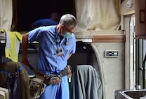 Doctor dawns medical belt