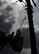 Photo of a electrical systems shop Airman performing emergency maintenance on an electrical pole