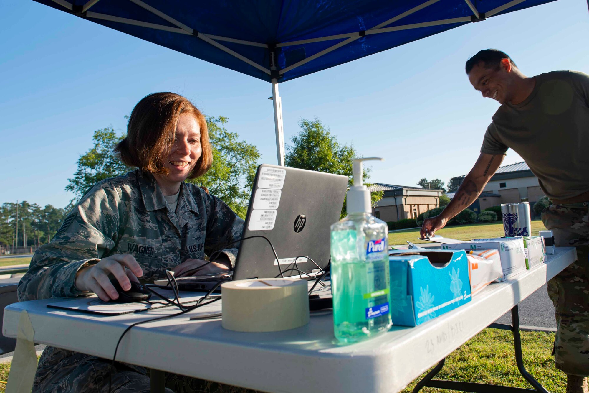 Photo of an Airman preparing for a COVID-19 Tier 2 screening.