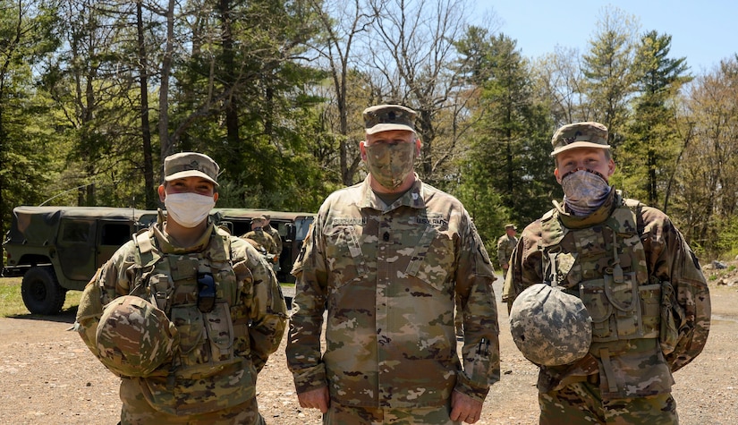 Command Sgt. Maj. Harry Buchanan III, the Pennsylvania National Guard’s senior enlisted leader, coined two Pennsylvania National Guard soldiers May 7 who stopped to render first aide to a motorcycle crash victim along Interstate 78 near Fort Indiantown Gap May 1.