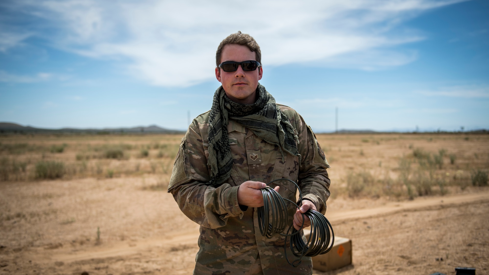 Members of the Explosive Ordnance Disposal unit, 812th Civil Engineer Squadron, 412th Test Wing, prepare unexploded ordnance and training munitions for demolition at the Precision Impact Range Area at Edwards Air Force Base, California, May 7. The 412th Test Wing uses the PIRA to conduct weapons and payload drops for flight tests. (Air Force photo by Giancarlo Casem)