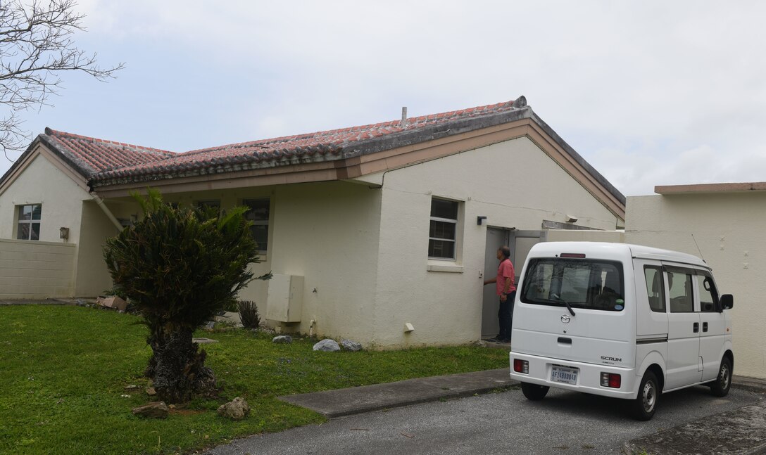 Inspector entering home.