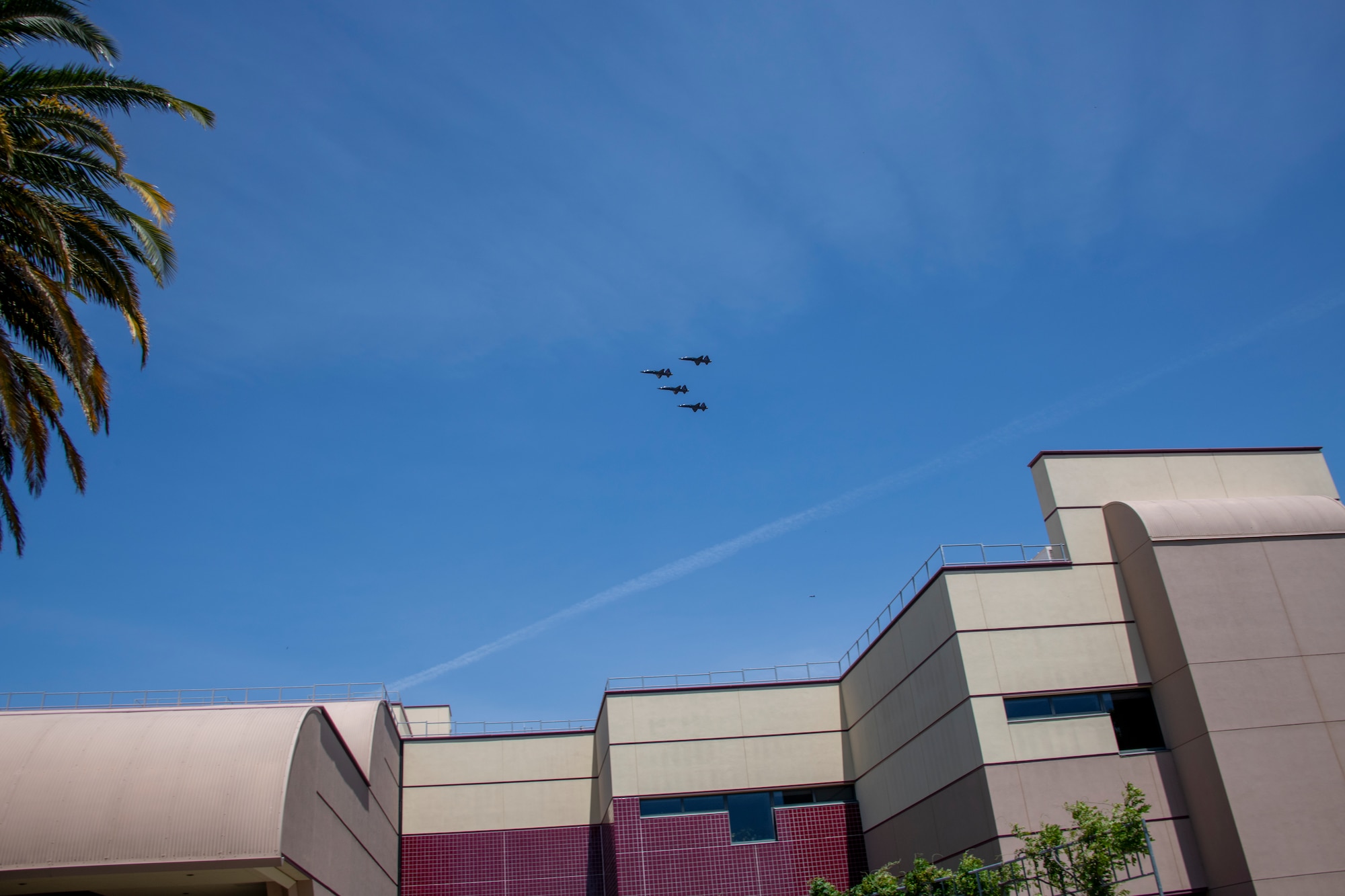 U.S. Air Force T-38A Talons assigned to the 9th Reconnaissance Wing at Beale Air Force Base, California, fly over David Grant USAF Medical Center during an Operation American Resolve flyover May 9, 2020, at Travis Air Force Base, California. The flyover was conducted to salute healthcare workers and first responders in Northern California cities impacted by COVID-19. (U.S. Air Force photo by Tech. Sgt. James Hodgman)