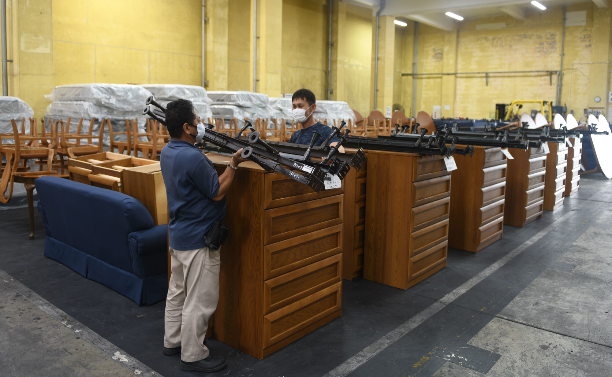 warehouse employees working