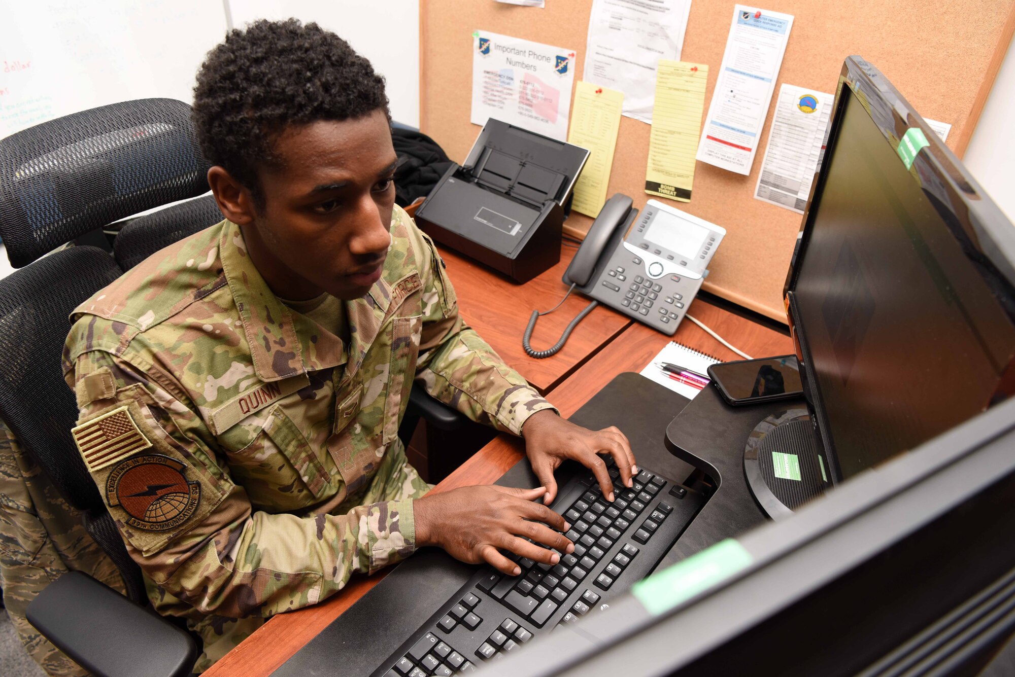U.S. Air Force Senior Airman Tavaris Quinn, 39th Communications Squadron knowledge management technician, manages teleworking websites, May 5, 2020, at Incirlik Air Base, Turkey. Knowledge management technicians maintain and ensure teleworking programs continue to be accessible from home. (U.S. Air Force photo by Tech. Sgt. Jim Araos)