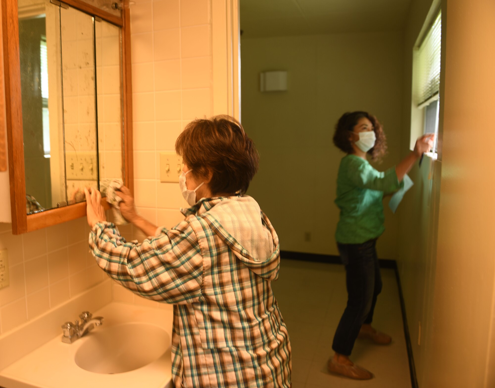 Home inspector and cleaning employee.