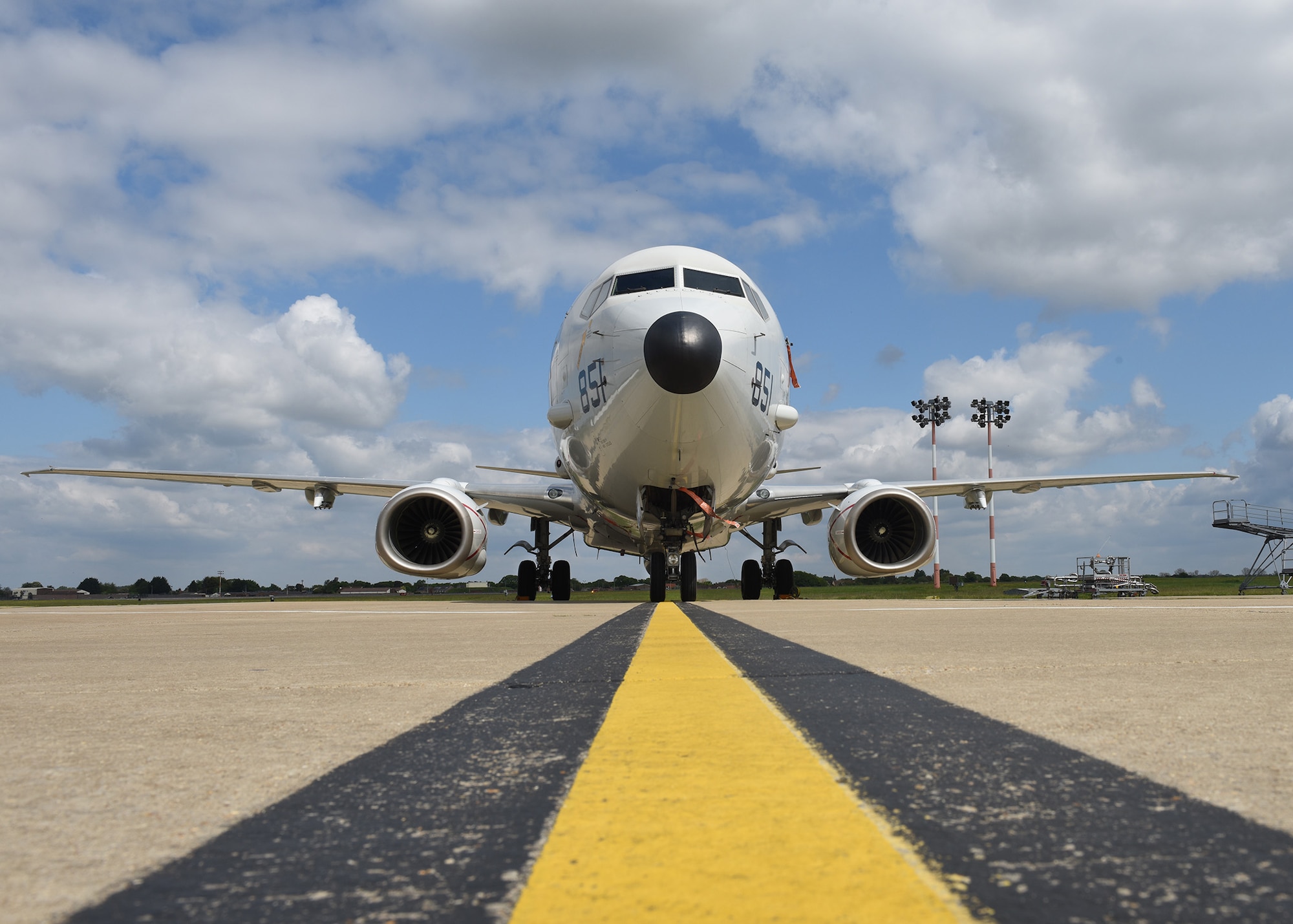 A U.S. Navy P-8A Poseidon maritime patrol and reconnaissance aircraft assigned to Patrol Squadron (VP-4) sits on the flight line at RAF Mildenhall May 2, 2020. The MPRA was at RAF Mildenhall to participate in operations and exercises with other U.S. assets and regional allies and partners. Patrol Squadron (VP-4) is forward-deployed to the U.S. 6th Fleet area of operations and is assigned to commander, Task Force 67, responsible for tactical control of deployed MPRA squadrons throughout Europe and Africa. (U. S. Air Force photo by Karen Abeyasekere)