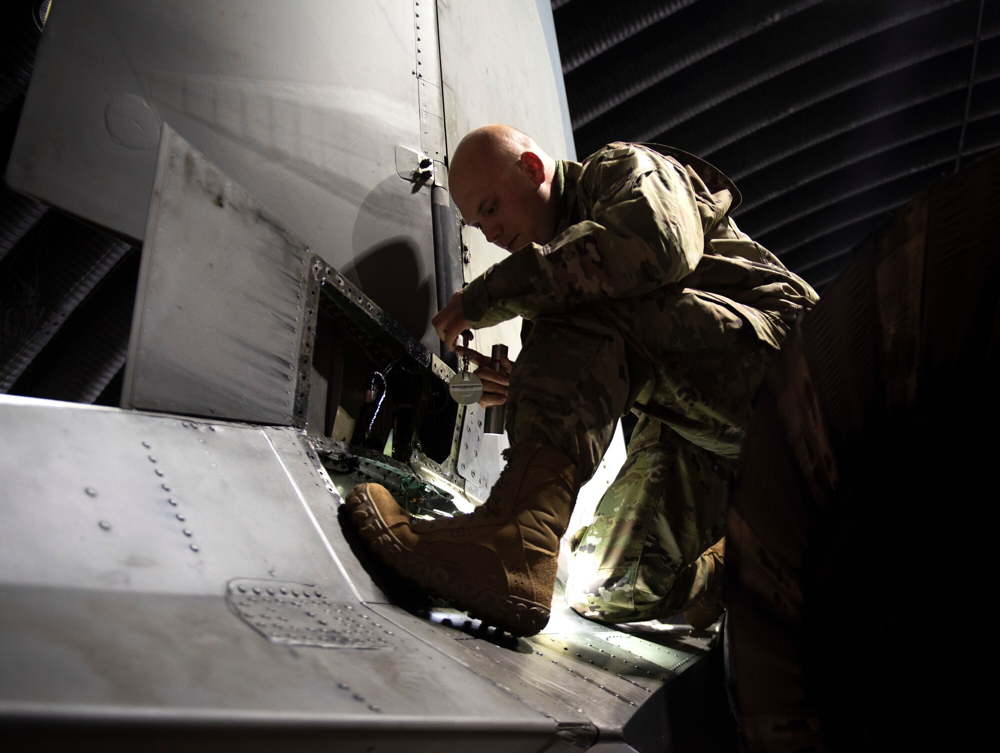A quality assurance Airman assigned to the 48th Maintenance Group inspects an F-15 aircraft at Royal Air Force Lakenheath, England, April 30, 2020. The Liberty Wing’s quality assurance shop helped the 48th MXG earn the 2019 USAFE-AFAFRICA Clements McMullen Memorial Daedalian Weapon System Maintenance Trophy. (U.S. Air Force photo by Airman 1st Class Madeline Herzog)