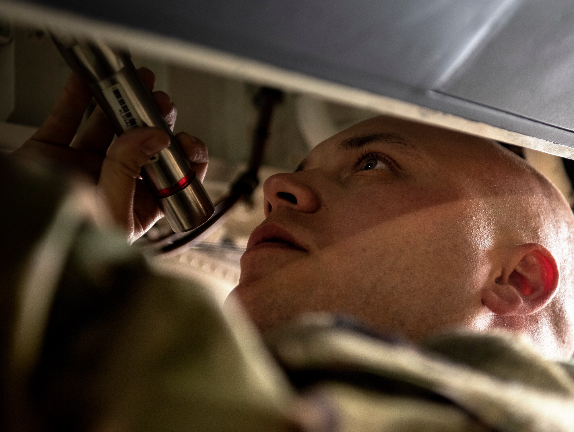 A quality assurance Airman assigned to the 48th Maintenance Group inspects an F-15 aircraft at Royal Air Force Lakenheath, England, April 30, 2020. The Liberty Wing’s quality assurance shop is one of many units that helped the 48th MXG earn the 2019 USAFE-AFAFRICA Clements McMullen Memorial Daedalian Weapon System Maintenance Trophy for a third consecutive year. (U.S. Air Force photo by Airman 1st Class Madeline Herzog)