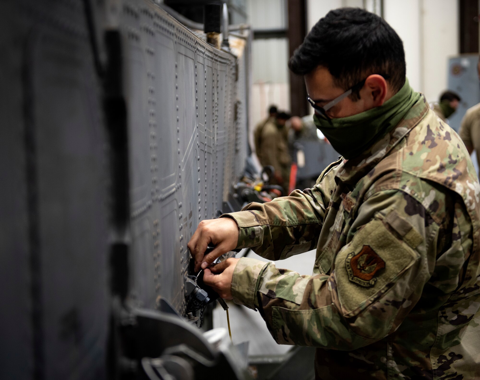 A fuel systems repair technician assigned to the 48th Maintenance Group prepares an external fuel tank for transport at Royal Air Force Lakenheath, England, April 30, 2020. The Liberty Wing’s fuel systems Airmen helped the 48th Maintenance Group earn the 2019 USAFE-AFAFRICA Clements McMullen Memorial Daedalian Weapon System Maintenance Trophy. (U.S. Air Force photo by Airman 1st Class Madeline Herzog)