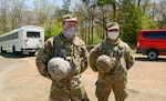 Pennsylvania National Guard Soldiers Pfc. Alyssa Cinquemani, a Black Hawk helicopter mechanic, and Cpl. Christopher Eppler, a wheeled-vehicle mechanic, stopped to render first aid to a motorcycle crash victim along Interstate 78 near Fort Indiantown Gap May 1, 2020.They were recognized for their actions with a coin presentation by Command Sgt. Maj. Harry Buchanan III, the Pennsylvania National Guard’s senior enlisted leader.