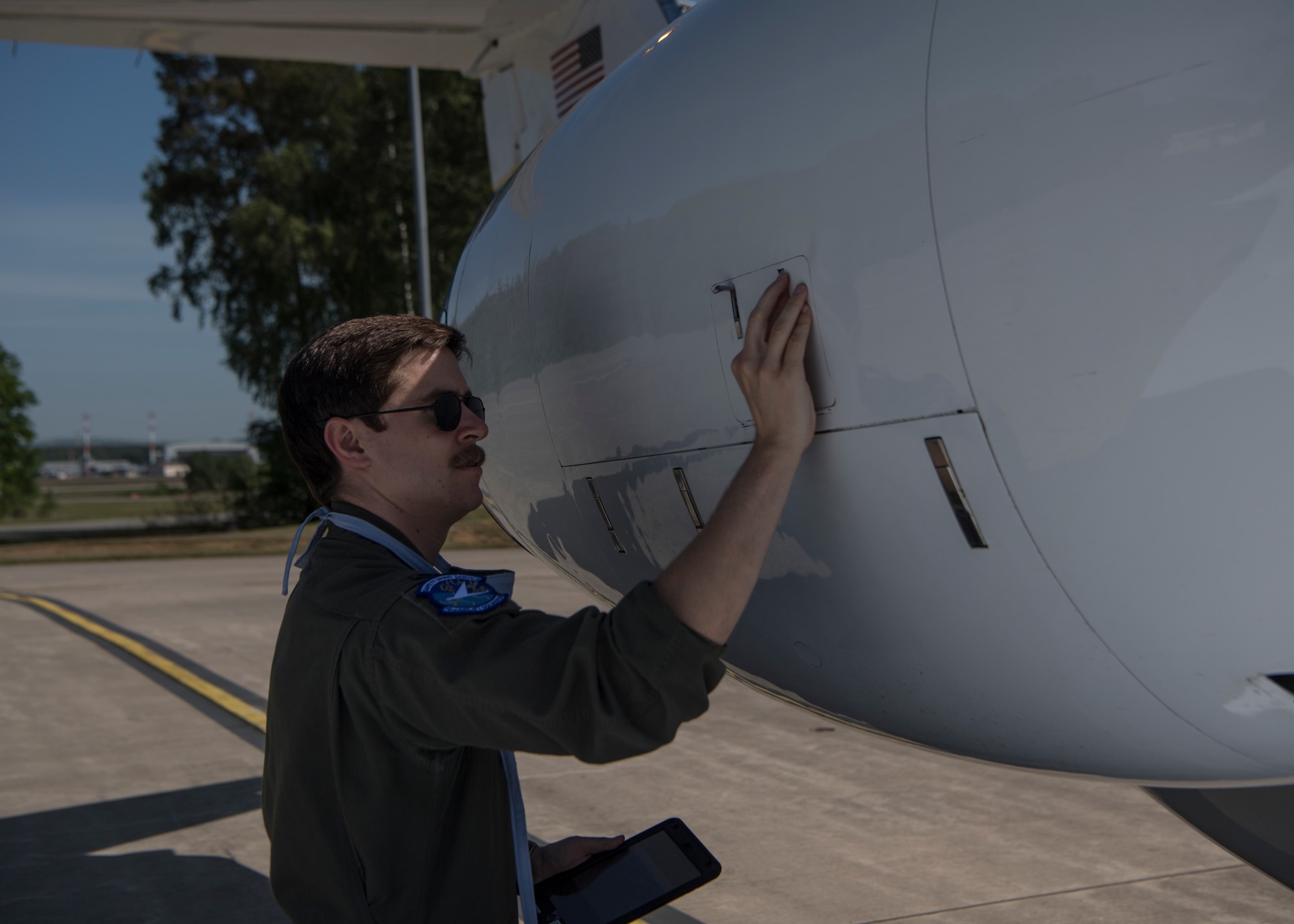 U.S. Air Force 1st Lt. Jacob Goodwin, 76th Airlift Squadron training officer, performs a preflight inspection for a C-21A Learjet, at Ramstein Air Base, Germany, May 8, 2020.