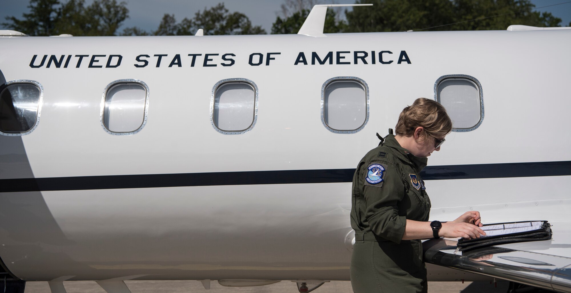 U.S. Air Force Capt. Taylor Stephens, 76th Airlift Squadron readiness flight commander, goes over flight plans at Ramstein Air Base, Germany, May 8, 2020