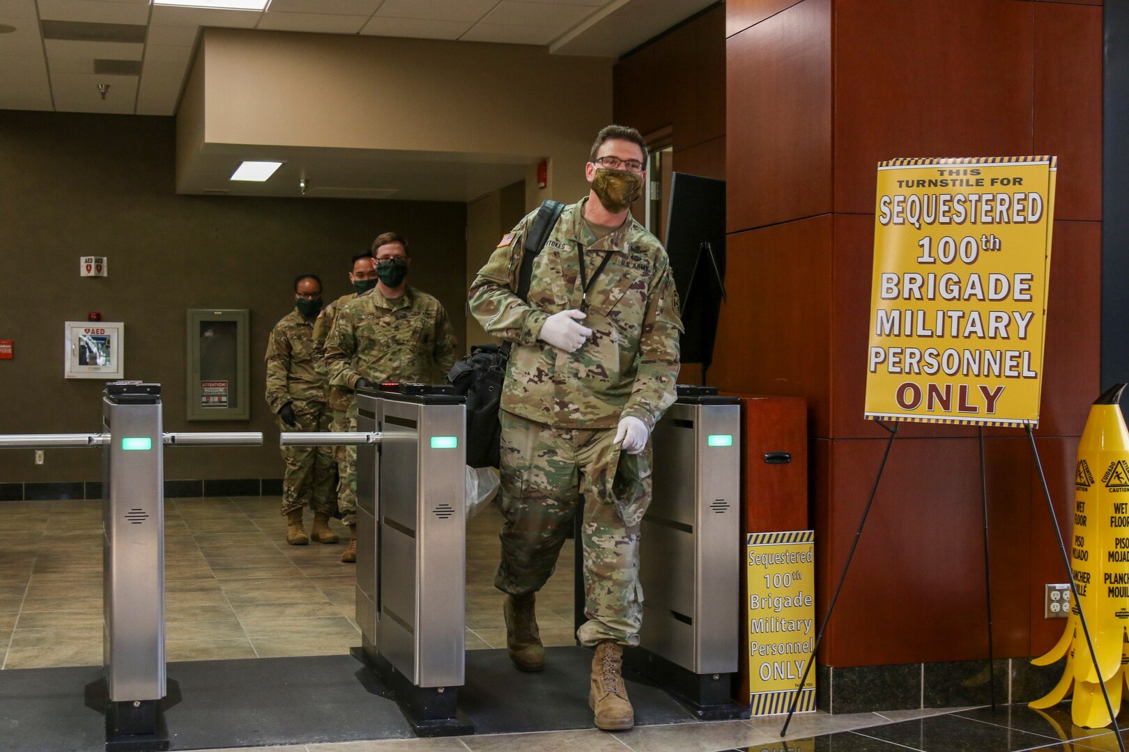 Members of a 100th Missile Defense Brigade crew exit the secure area at Schriever Air Force Base following their shift April 30, 2020. Since the onset of the pandemic, the 100th Brigade has implemented measures to ensure the continued execution of its mission including sequestering crew members away from their homes and families.