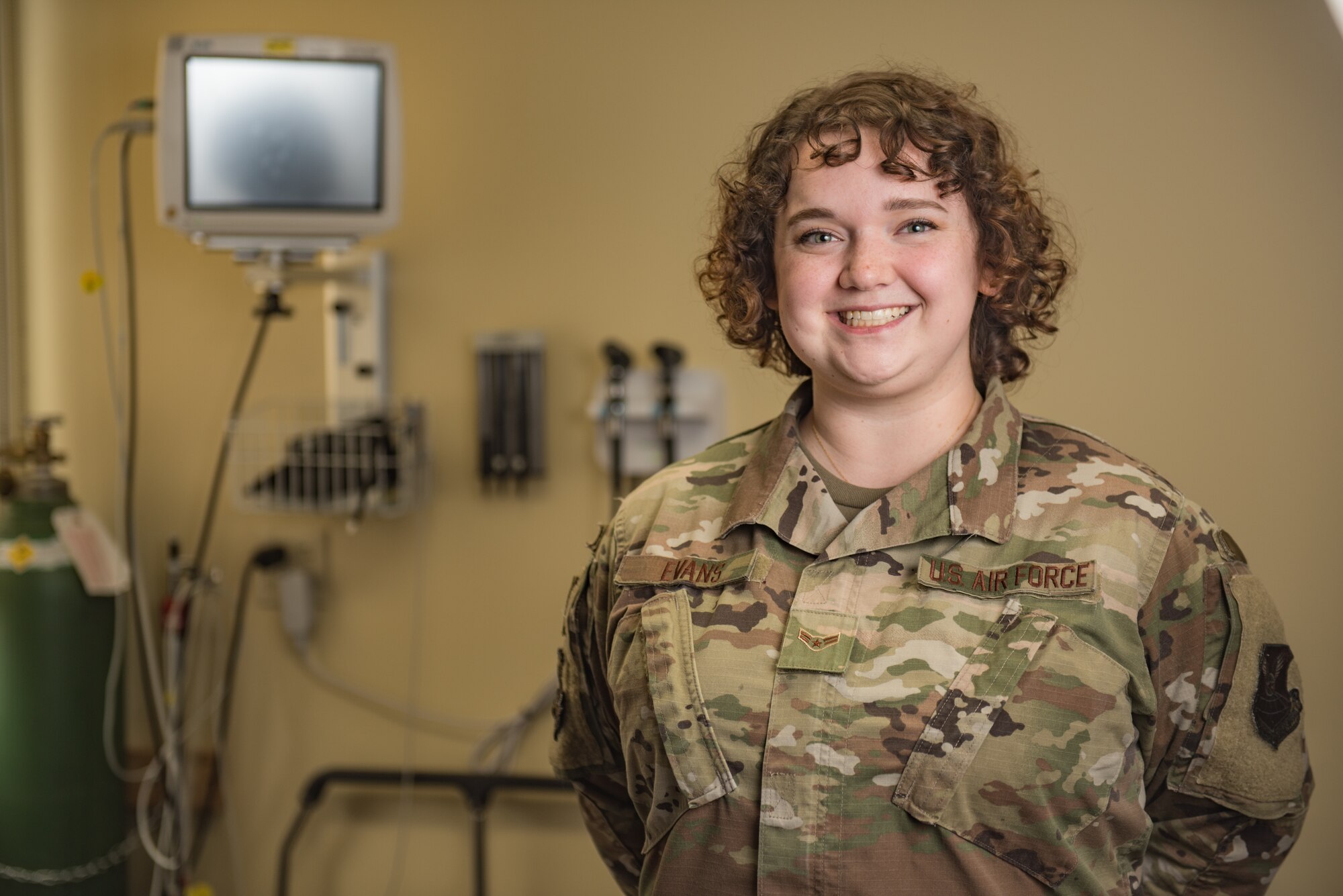 Airman 1st Class Ashley Evans, a Medical Operations Squadron medical technician, stands in front of medical equipment May 6, 2020, at Whiteman Air Force Base, Missouri.