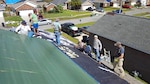 Volunteers formed The North Lagoon Navy group after Hurricane Michael in 2018 to aid local residents in tarping roofs, cutting trees, etc. The group was made up of local personnel from Naval Surface Warfare Center Panama City Division, as well as other individuals.