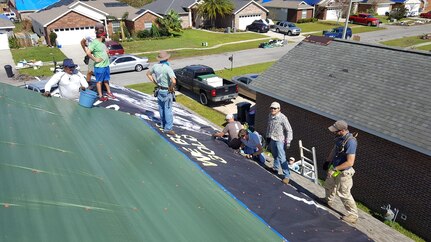 Volunteers formed The North Lagoon Navy group after Hurricane Michael in 2018 to aid local residents in tarping roofs, cutting trees, etc. The group was made up of local personnel from Naval Surface Warfare Center Panama City Division, as well as other individuals.