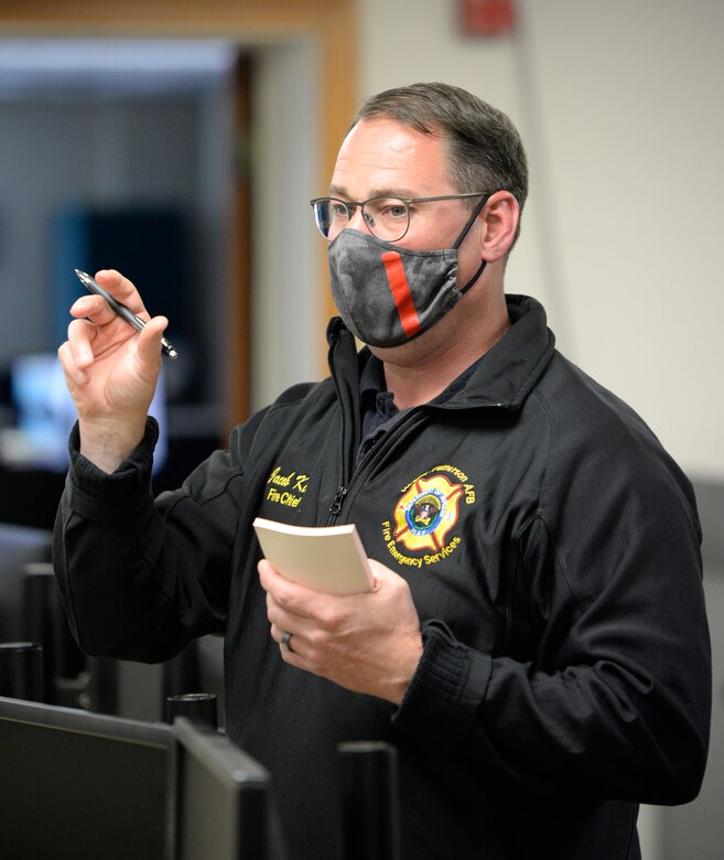 Jacob King, 88th Air Base Wing Incident Command Center fire chief, briefs 88 ABW ICC  personnel at Wright-Patterson Air Force Base, Ohio, May 5, 2020. (U.S. Air Force photo/Ty Greenlees)