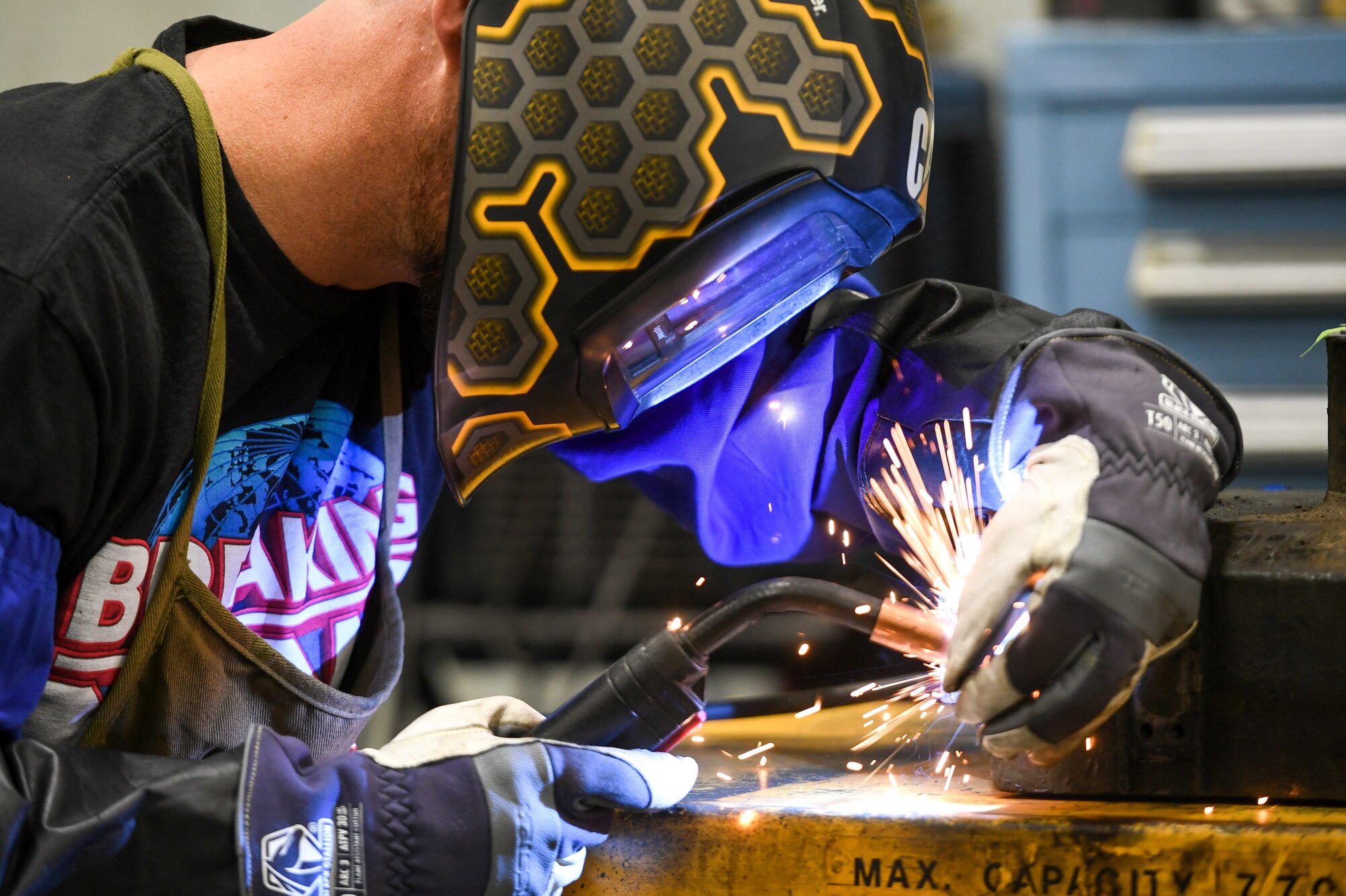 Greg Olsen, 309th Electronics Maintenance Group, welds a part from a B-809 ground power unit April 29, 2020, at Hill Air Force Base, Utah. The 309th EMXG in the Ogden Air Logistics Complex provides repair and overhaul for exchangeable assets for a multitude of systems on a wide assortment of Air Force weapons systems including fighter aircraft, intercontinental ballistic missiles, powered aerospace ground equipment, tactical shelters, as well as refurbishment of radomes worldwide. (U.S. Air Force photo by Cynthia Griggs)