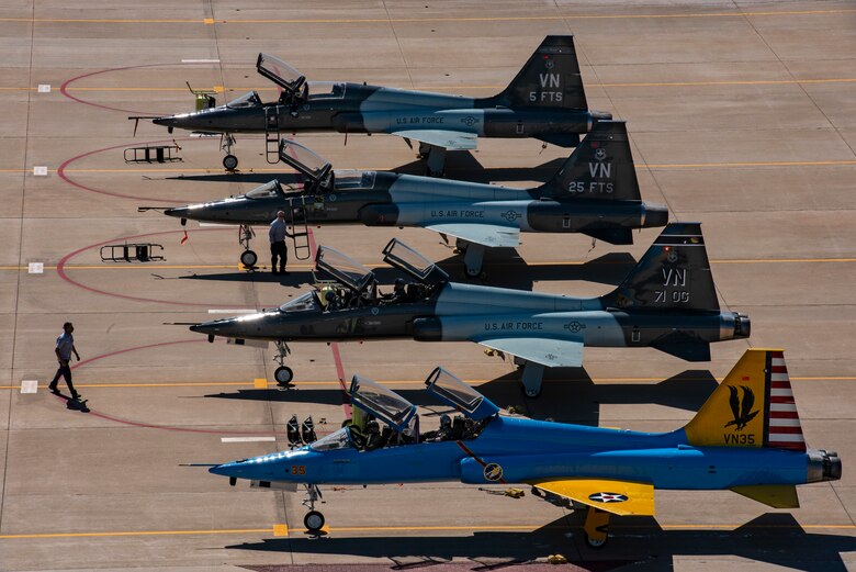 T38 squadron changes commanders during fourship formation over