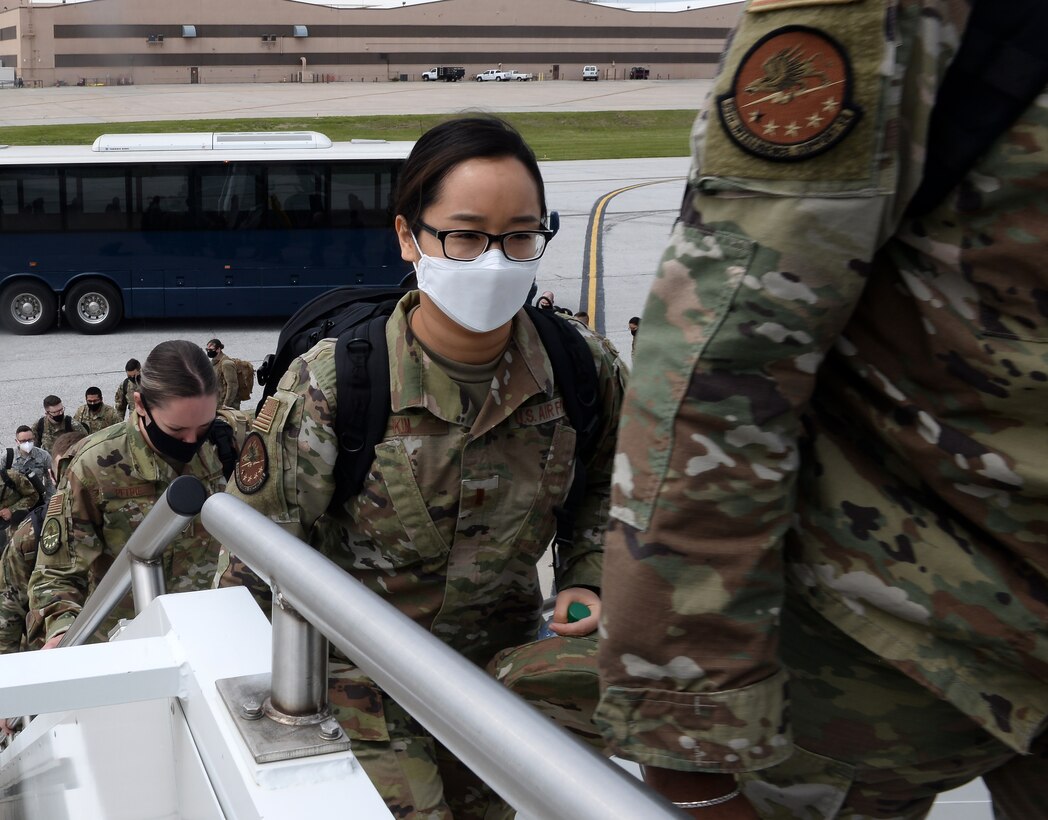 Military members boards aircraft