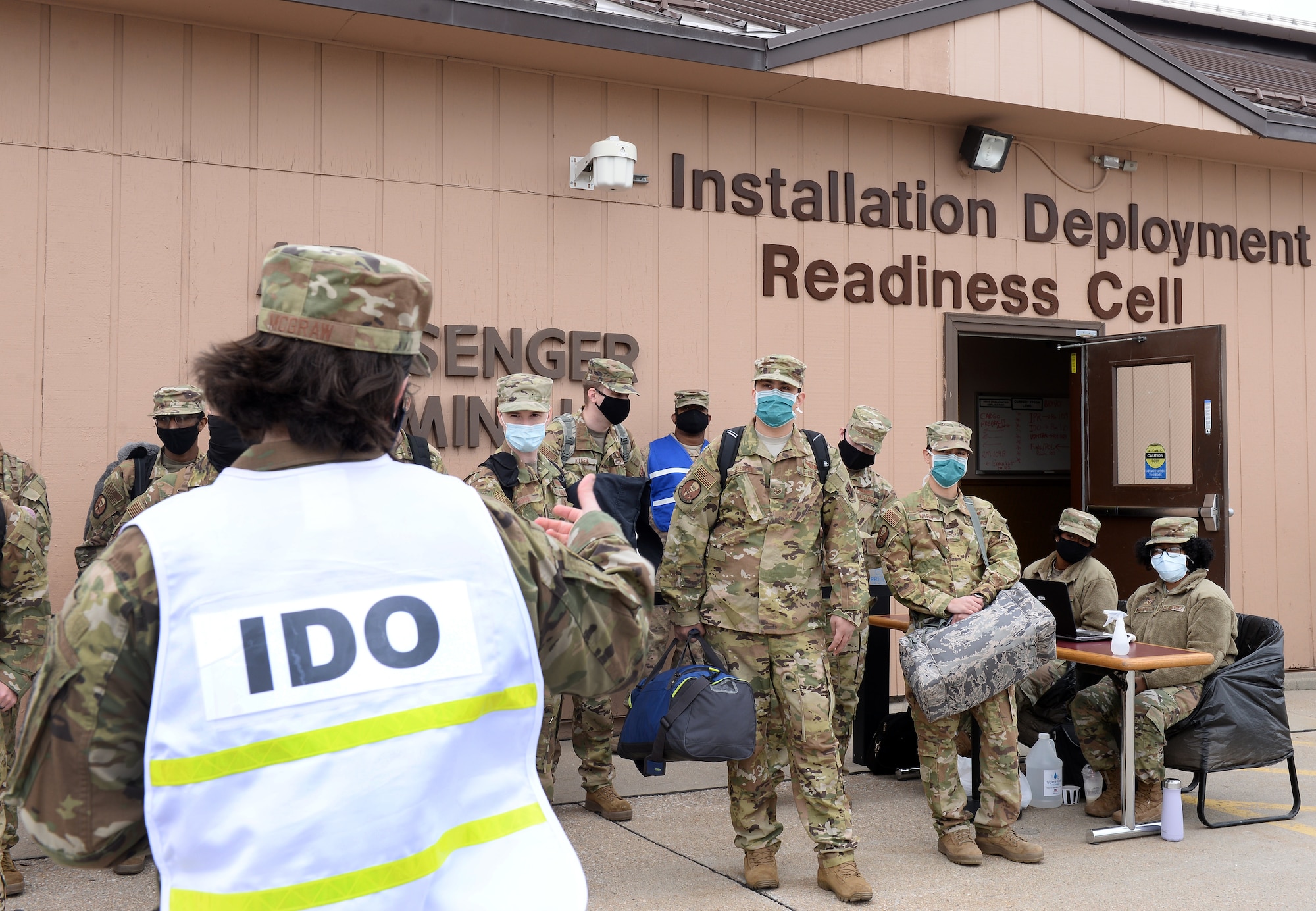 Military members are hearing a briefing.
