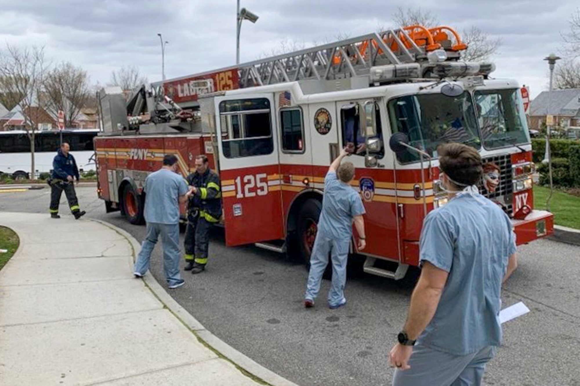 Members from the FDNY’s Engine 315 and Ladder 125 in Queens, N.Y., cooked and delivered food to the Air Force Reserve respiratory therapists working at Queens Hospital Center who then distributed the food to the rest of the Air Force doctors and nurses working at the hospital.