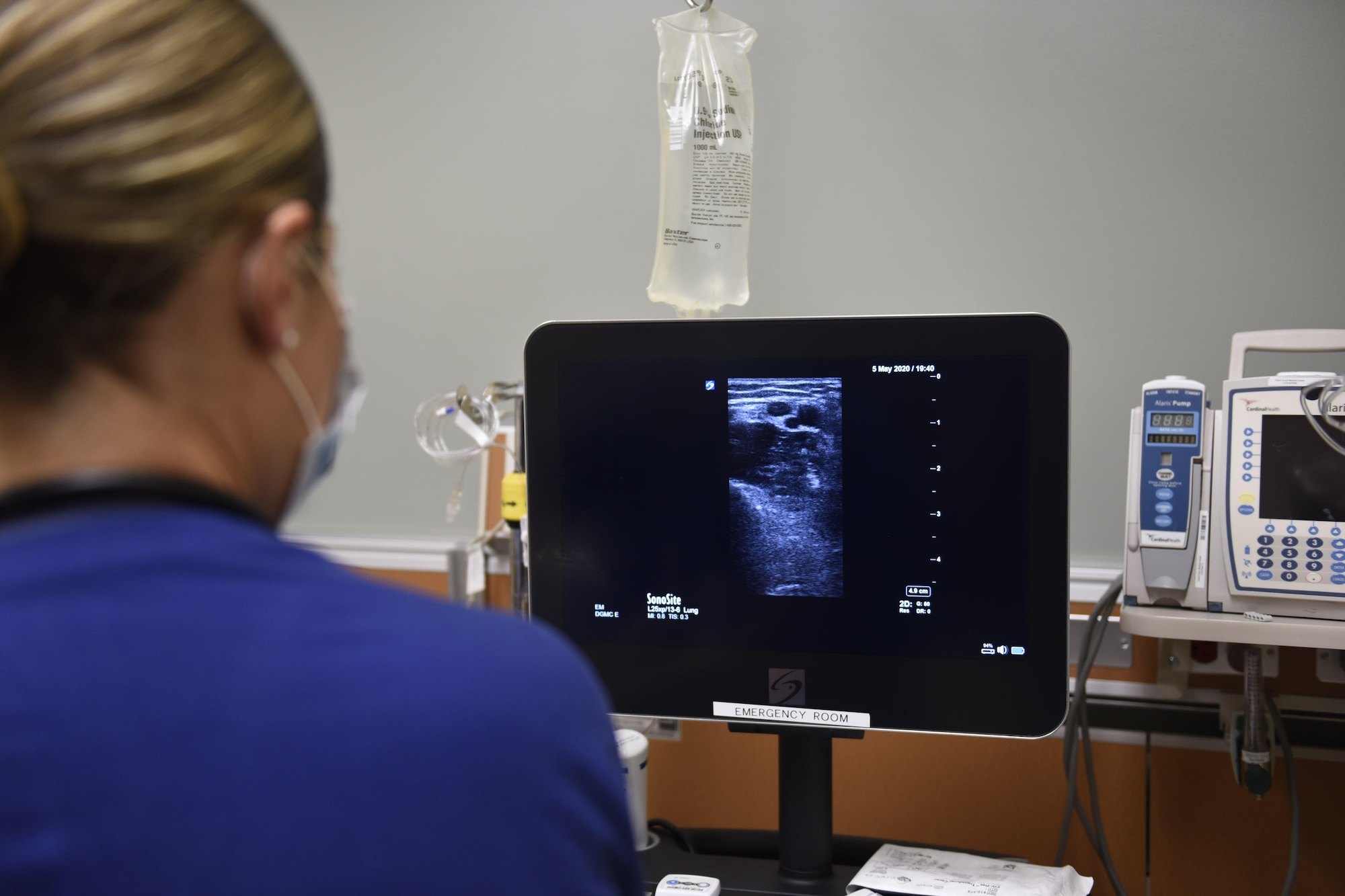 U.S. Air Force 1st Lt. Mariah Pruett, 60th Medical Operations Squadron clinical nurse, observes an ultrasound image May 5, 2020, at Travis Air Force Base, California. May 6-12 is National Nurse Week, a week that celebrates medical professionals, like Pruett, who are on the frontlines of patient-centered care every day. (U.S. Air Force photo by Airman 1st Class Cameron Otte)