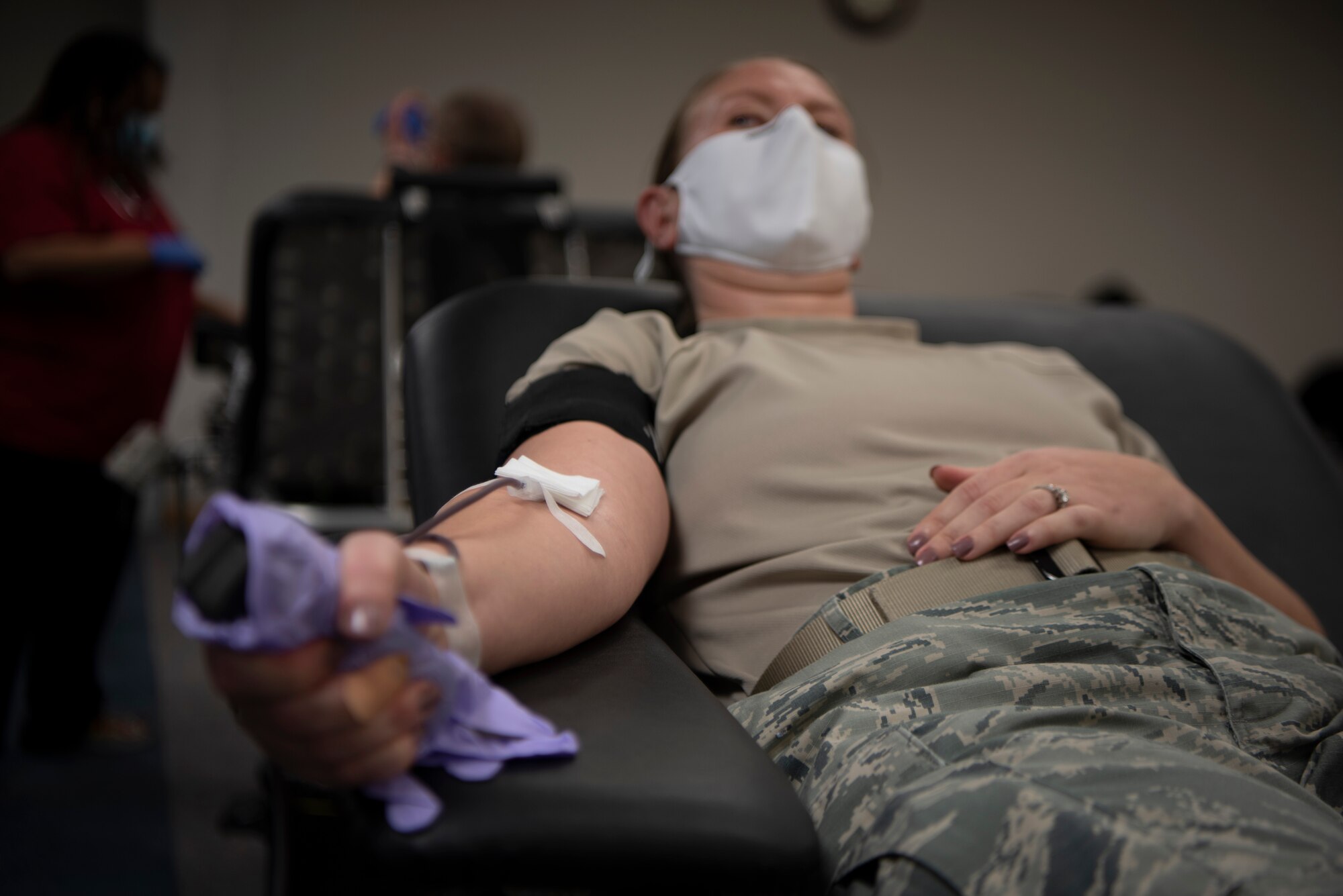 Airman getting blood drawn.