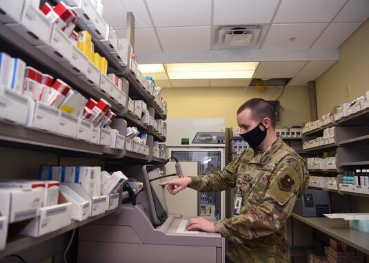 U.S. Air Force Capt. Adam Remme, 17th Medical Group pharmacy element chief, mandates prescription refills during the preparations for the Ross Clinic pharmacy’s curbside reinstatement on Goodfellow Air Force Base, Texas, May 6, 2020. Remme managed the pharmacy and its staff for two years. (U.S. Air Force photo by Airman 1st Class Abbey Rieves)
