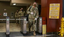 Members of a 100th Missile Defense Brigade crew exit the secure area at Schriever Air Force Base following their shift April 30, 2020. Since the onset of the pandemic, the 100th Brigade has implemented measures to ensure the continued execution of its mission including sequestering crew members away from their homes and families. (U.S. Army National Guard photo by Staff Sgt. Zachary Sheely)